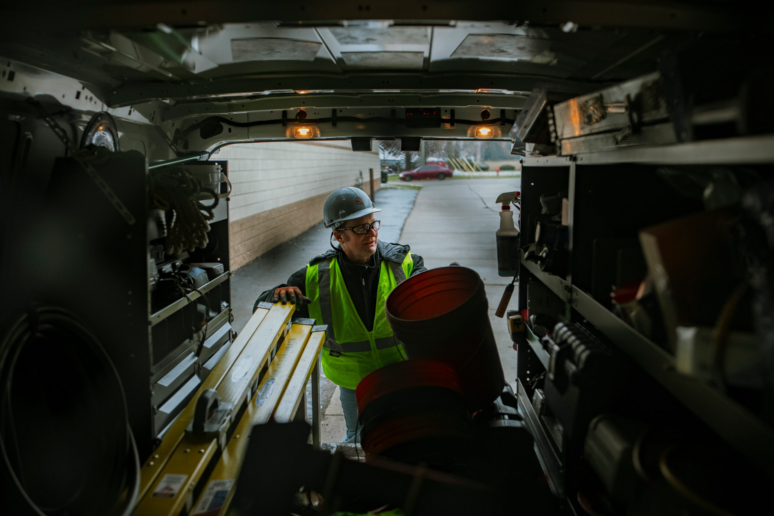 Sylvan HVAC worker in a work truck