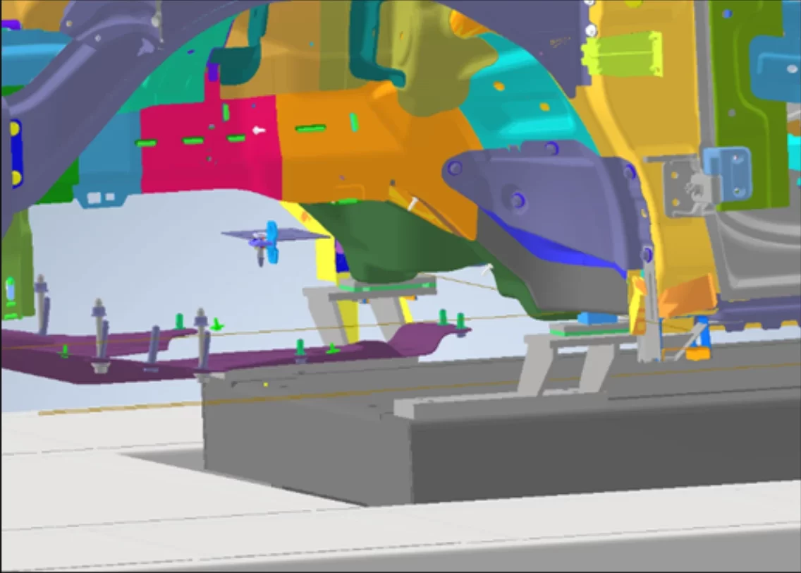 BIM clash detection model of an automotive conveyor system showing color-coded structural and mechanical components